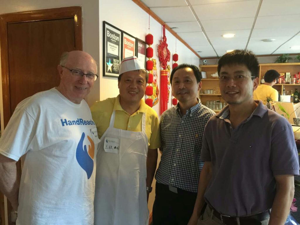 Stephen McIntosh (HandReach), Yueming Wang, Peter Liu (Sichuan Gourmet), and Liming Liang